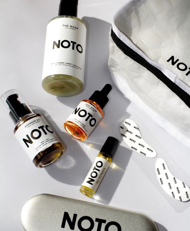 Assortment of Noto Botanics beauty products and packaging