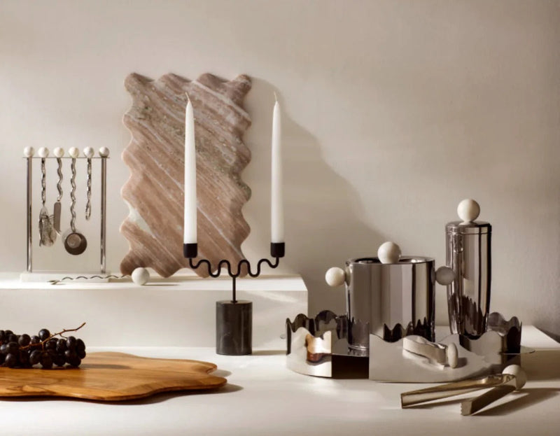 Chrome, wood, and marble barware and kitchen decor