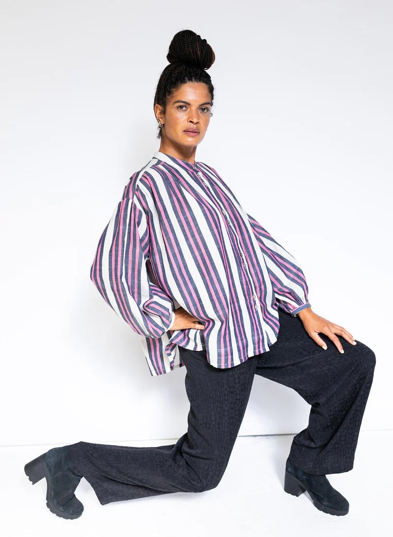 Model wearing Seek Collective Clothing