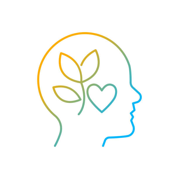 Mindfulness clip art of human head outline filled with a flower and heart