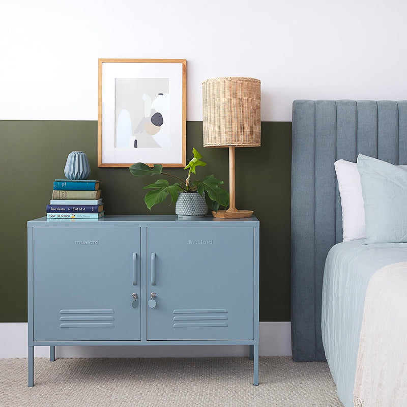 Styled blue locker in a bedroom by Mustard Made