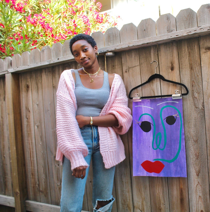 Portrait of artist Tomisin Oluwole