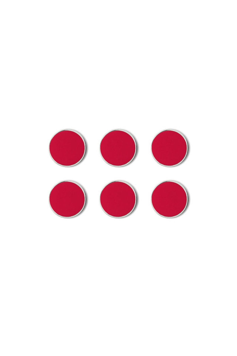 Six red circular magnets on a white background