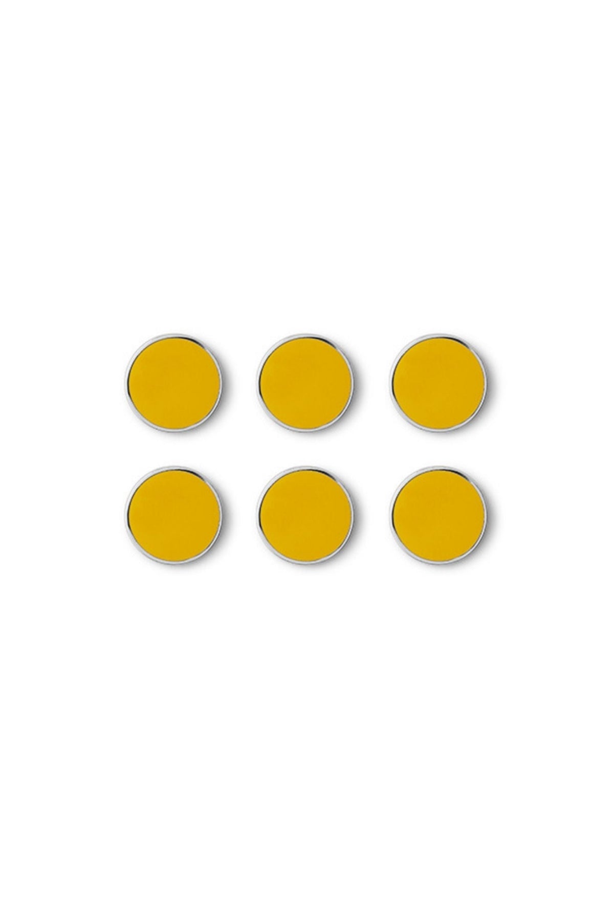 Six yellow circular magnets on a white background