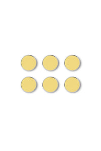 Six yellow circular magnets on a white background