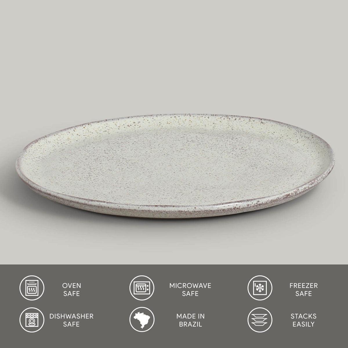 Round ceramic plate with speckled texture on a gray background, featuring icons and text about safety and features.
