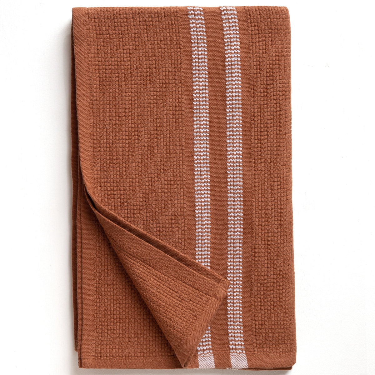 Rust color textured bath towel with white stripes