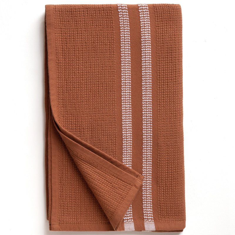 Rust color textured bath towel with white stripes
