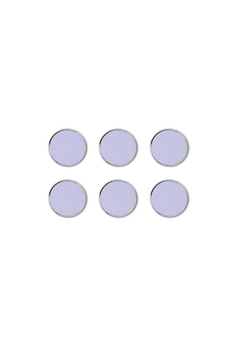 Set of six purple circular magnets on a white background