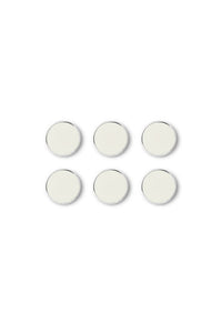 Set of six round white magnets with silver trim on a white background