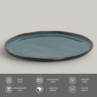 Blue ceramic plate on a gray background with safety and feature icons at the bottom.