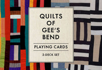 Playing cards set titled 'Quilts of Gee's Bend' with a colorful quilt pattern in the background.