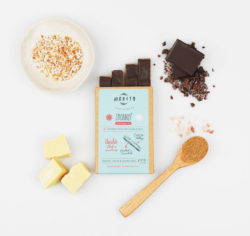 Morito chocolate sticks with ingredients on a white background