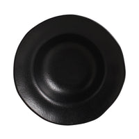 Black ceramic plate on a white background