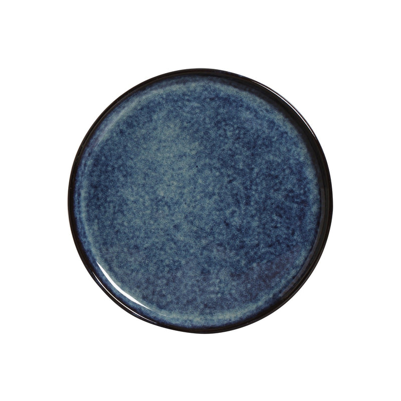 Blue ceramic plate on a white background