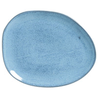 Blue ceramic plate on a white background
