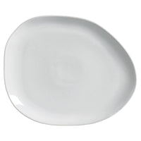 White ceramic plate on a white background