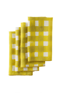 Set of yellow checkered napkins on a white background