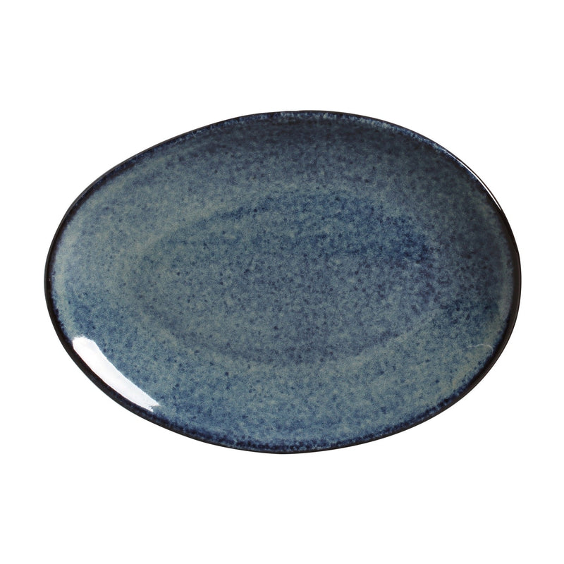 Blue ceramic plate on a white background