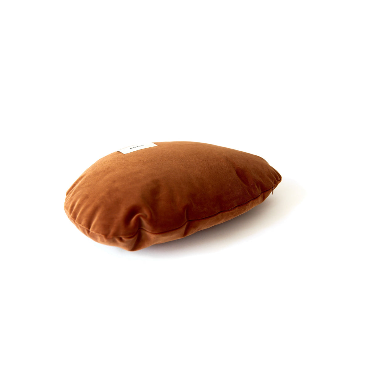 Brown pillow on a white background