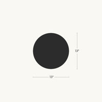 Black circle with measurement label indicating a 13 inch diameter on a white background