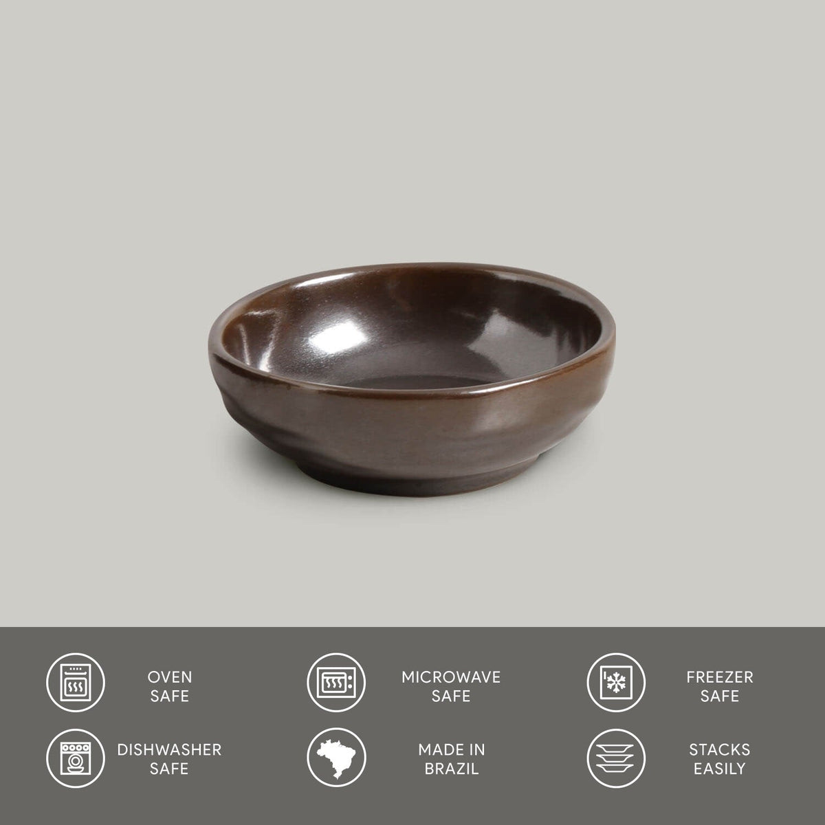 Metallic ceramic bowl on a gray background with safety and feature icons at the bottom.