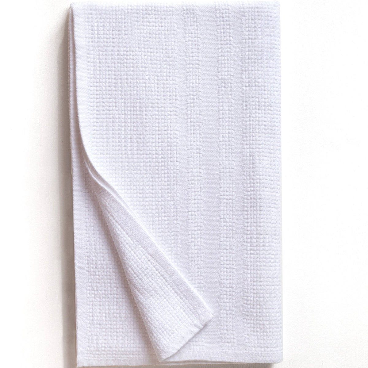 White textured bath towel folded