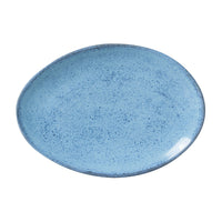 Blue ceramic plate on a white background
