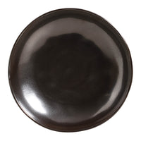 Black ceramic pasta plate on a white background