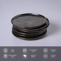 Stack of black ceramic plates on a light gray background with safety and feature icons at the bottom.