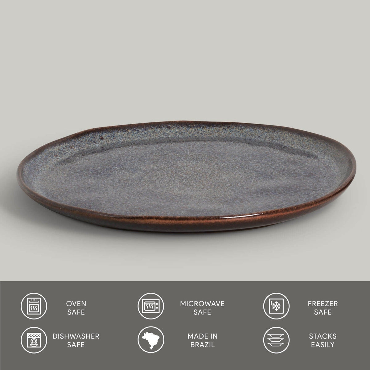 Ceramic plate with speckled design on a gray background