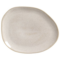 Beige ceramic plate on a white background