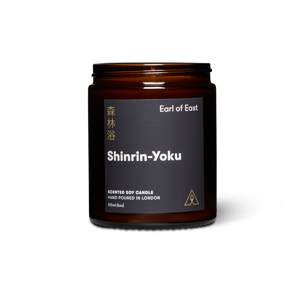 Dark jar scented soy wax candle with label reading Earl of East Shinrin-Yoku