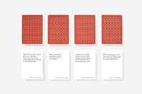 Four red card designs with geometric patterns on a white background