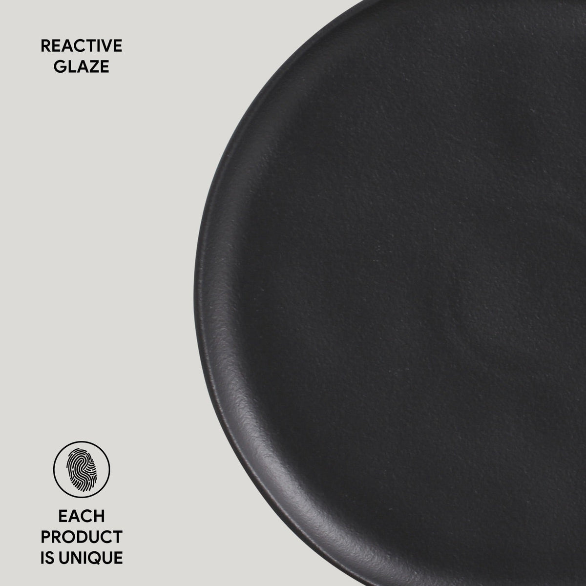 Black ceramic plate with 'Reactive Glaze' text and 'Each Product is Unique' label on a light gray background.
