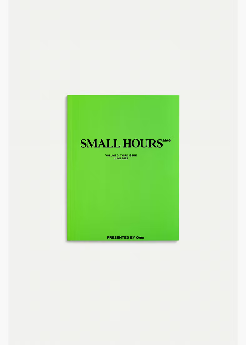 Green magazine cover with 'Small Hours' text on a white background