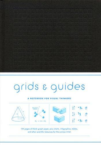 Black hard cover notebook with grid lines on cover and text about 'grids & guides' 