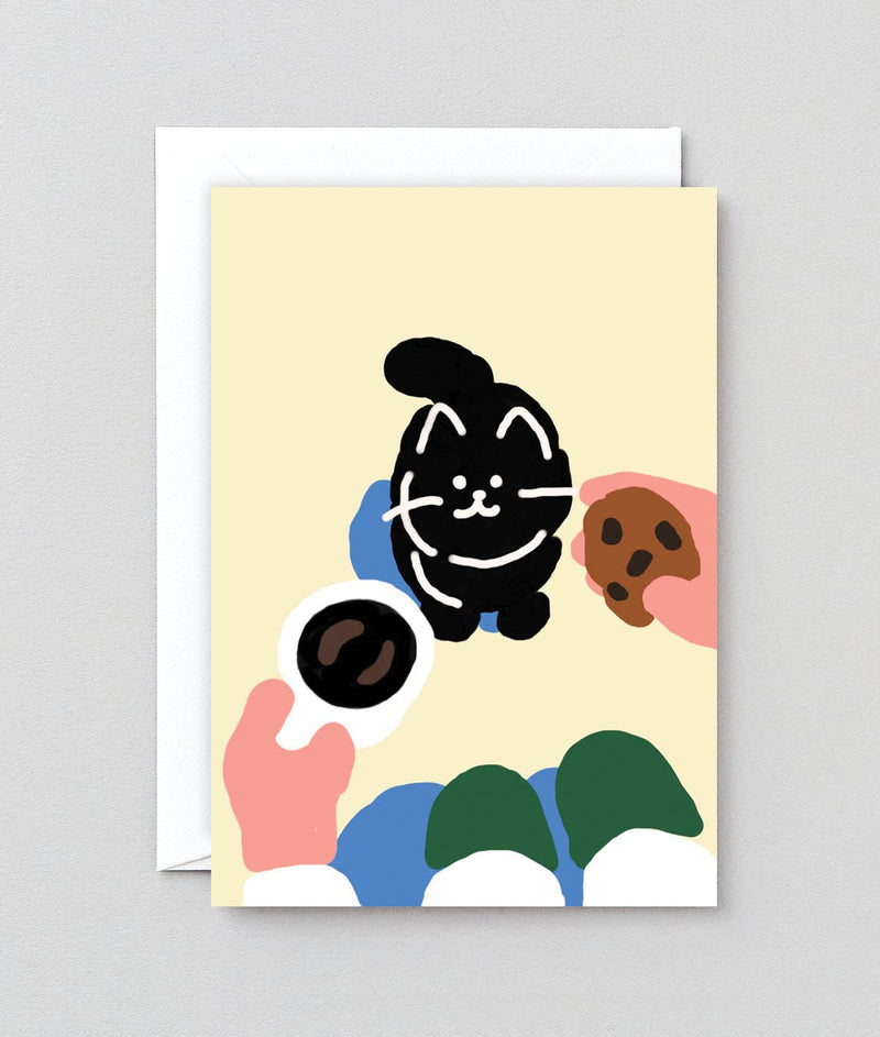 Greeting card with a black cat illustration on a beige background