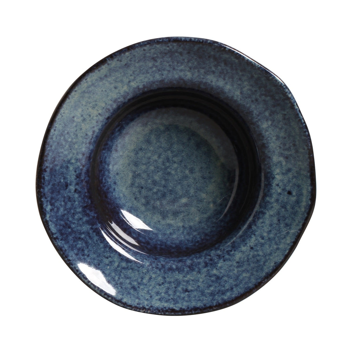 Blue ceramic bowl on a white background
