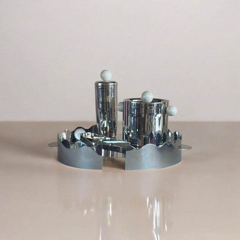 Bar set on a stainless steel tray on a neutral surface