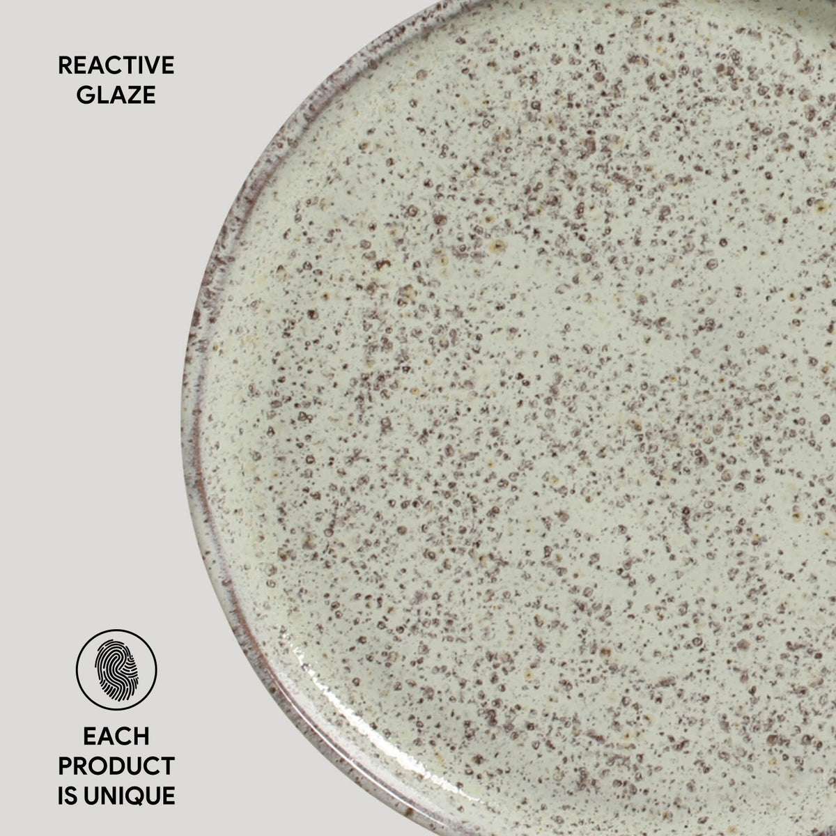 Ceramic plate with reactive glaze on a white background