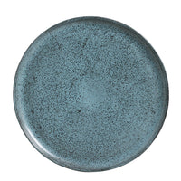 Blue ceramic plate with speckled texture on a white background