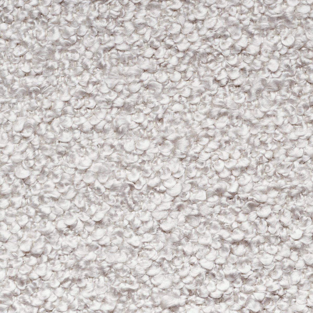 Close-up of a textured light grey fabric
