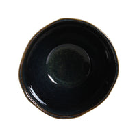 Black ceramic bowl on a white background