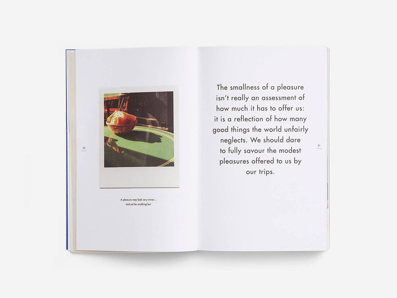 Open book with text and a small image on a white background