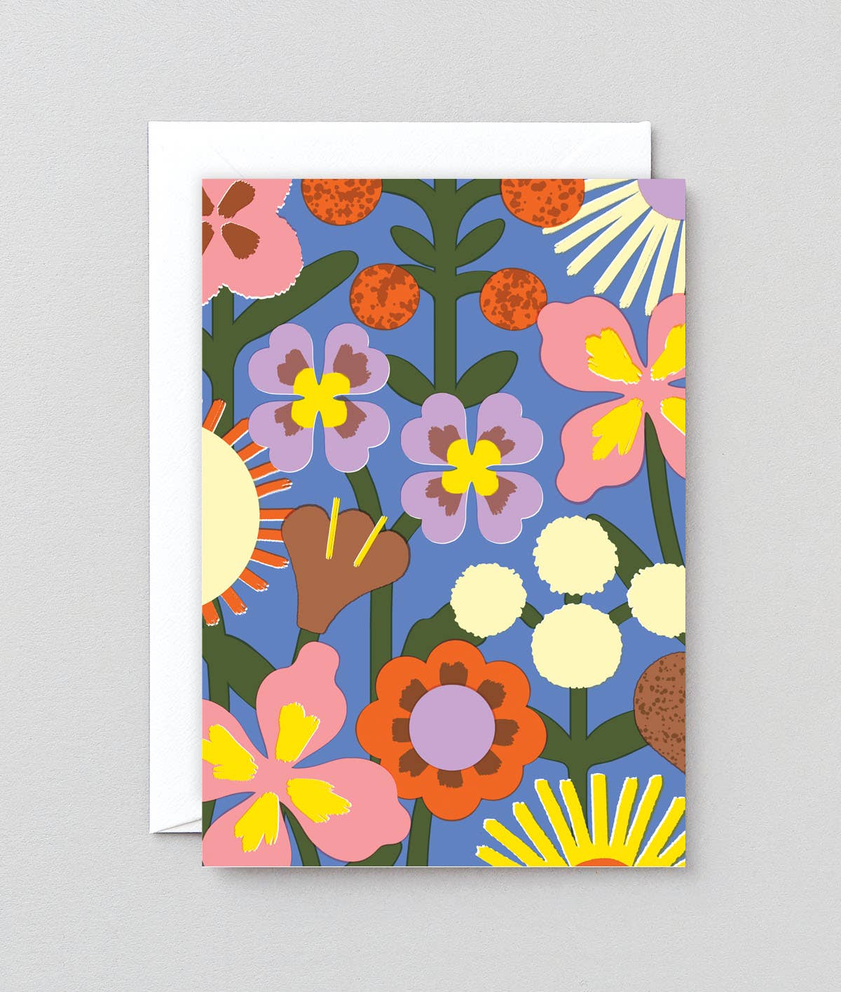 Colorful floral pattern card with envelope on a gray background