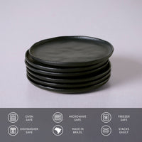 Stack of black ceramic plates on a light gray background with safety and origin icons below.