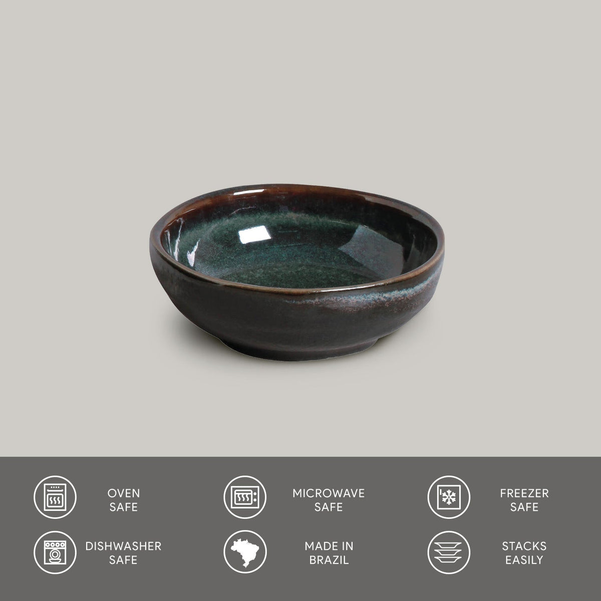 Ceramic bowl with greenish-brown glaze on a gray background