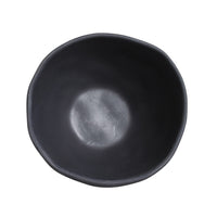 Black ceramic bowl on a white background