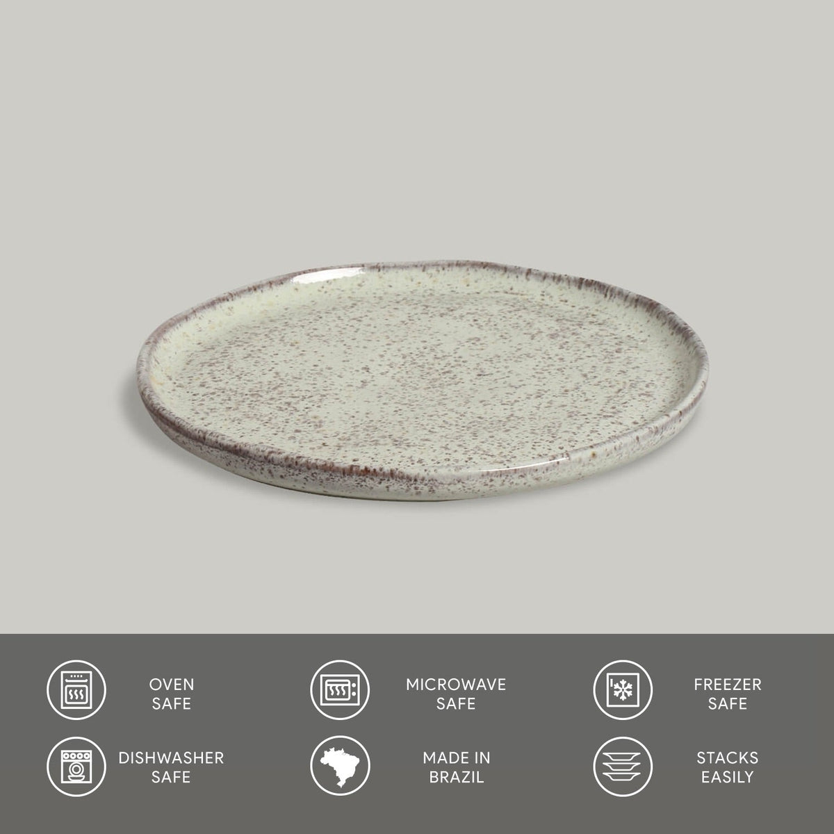 Speckled ceramic plate on a gray background with safety and feature icons below.